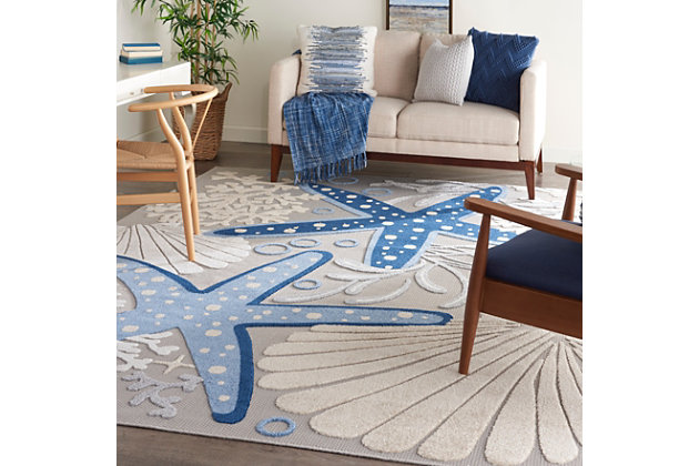 Roll out your own little slice of the beach life with this coastal indoor/outdoor area rug from the aloha collection. Breezy starfish, sea shells, and undersea bubbles woven in cool gray, blue, white, and ivory tones set a foundation for relaxation on your patio, deck, or anywhere inside your home. Expertly machine made of premium, stain resistant fibers, this aloha area rug offers durability and ease of cleaning (just rinse with a hose and air dry).Serged edges | Premium stain-resistant fibers for durability and easy cleaning | Combination weave | Machine made from easy-care fibers | Power-loomed | Low shedding | Recommended for areas with heavy foot traffic | Indoor/outdoor | Adding a layer of padding helps cushion the rug and diminish pressure, helping to prolong the rug's life; also, the extra padding helps reduce sound in the room | Rug pad recommended | Vacuum regularly, clean spills immediately by blotting with a clean damp sponge or cloth; rinse with a hose if cleaning it outdoors; to extend the life of this area rug, bring it indoors during extreme weather | 100% polypropylene | Imported