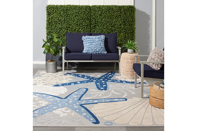 Roll out your own little slice of the beach life with this coastal indoor/outdoor area rug from the aloha collection. Breezy starfish, sea shells, and undersea bubbles woven in cool gray, blue, white, and ivory tones set a foundation for relaxation on your patio, deck, or anywhere inside your home. Expertly machine made of premium, stain resistant fibers, this aloha area rug offers durability and ease of cleaning (just rinse with a hose and air dry).Serged edges | Premium stain-resistant fibers for durability and easy cleaning | Combination weave | Machine made from easy-care fibers | Power-loomed | Low shedding | Recommended for areas with heavy foot traffic | Indoor/outdoor | Adding a layer of padding helps cushion the rug and diminish pressure, helping to prolong the rug's life; also, the extra padding helps reduce sound in the room | Rug pad recommended | Vacuum regularly, clean spills immediately by blotting with a clean damp sponge or cloth; rinse with a hose if cleaning it outdoors; to extend the life of this area rug, bring it indoors during extreme weather | 100% polypropylene | Imported