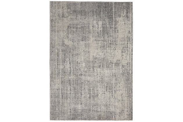 A richly-textured abstract design gives this Calvin Klein Vapor area rug unique sophistication. With its softly inviting pile and cool gray and ivory palette, this elevated piece is an urbane addition to the modern, eclectic home.Made of viscose and polyester | Machine made; power loomed | Backed with latex | Serged edges | Moderate shedding  |  pile | Vacuum regularly; no beater bar | Rug pad recommended | Imported