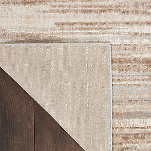 Earthen tones in abstract irregular stripes create an irresistibly chic foundation for your living room, bedroom or home office. Whether your design tastes are minimalistic or a little more rustic glam, this neutral ivory, beige and gray area rug from the Elation Collection is just what you need to bring the disparate elements of your room together.Made of polypropylene and polyester | Machine made; power loomed | Backed with latex | Serged edges | Low shedding | Low pile | Vacuum regularly; no beater bar | Rug pad recommended | Imported