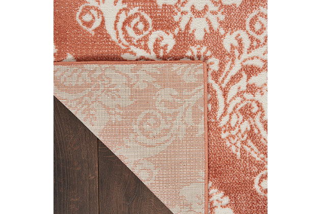 Capture the rustic elegance of a French country cottage with this area rug from the Elation Collection. Sprawling floral damask motifs in ivory on a muted brick red base create a captivating base for French country, farmhouse and boho-chic settings. Subtle abrash effects add to the vintage look of this design.Made of polypropylene and polyester | Machine made; power loomed | Backed with latex | Serged edges | Low shedding | Low pile | Vacuum regularly; no beater bar | Rug pad recommended | Imported