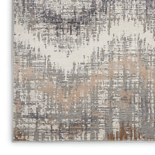 The abstract jagged chevron pattern of this Elation Collection area rug creates a sense of movement in modern and contemporary settings. Cool gray, charcoal, ivory, beige and brown hues add a unique touch to your living room, bedroom or home office. 
Made of polypropylene and polyester | Machine made; power loomed | Backed with latex | Serged edges | Low shedding  | Low pile | Vacuum regularly; no beater bar | Rug pad recommended | Imported