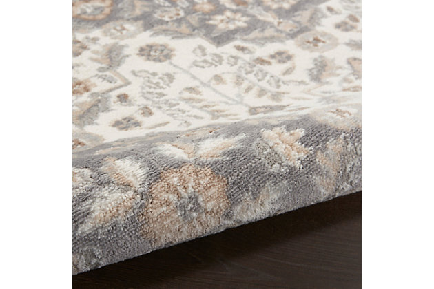 A nod to traditional Persian designs, this area rug from the Elation Collection is reinterpreted for the modern age. Classic floral and diamond patterns are rendered in soft blue and ivory for an elegant foundation in farmhouse, boho-chic and contemporary decor. It’s an ideal choice for high-traffic areas.Made of polypropylene and polyester | Machine made; power loomed | Backed with latex | Serged edges | Low shedding | Low pile | Vacuum regularly; no beater bar | Rug pad recommended | Imported