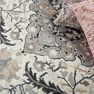 A stunning floral center medallion in soft ivory and brick red tones makes this Elation area rug a sophisticated foundation for modern farmhouse, boho-chic and French country settings. The vintage-inspired design is ideal for use in your living room, bedroom, dining room or any area that needs an instant style boost.Made of polypropylene and polyester | Machine made; power loomed | Backed with latex | Serged edges | Low shedding | Low pile | Vacuum regularly; no beater bar | Rug pad recommended | Imported