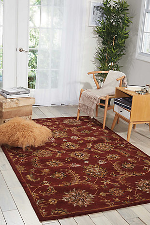 A narrow, linear border gives a new, modern feeling to Persian heritage in this sumptuous rug. Floral motifs and airy ferns dance to the very edge, filling the room with visual interest. A compelling design element for the contemporary home. Made of wool | Handcrafted | Backed with cotton | Moderate shedding  | Tufted | Vacuum regularly; spot clean; professional cleaning recommended  | Rug pad recommended | Imported