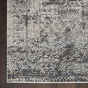 The intrigue of antiquity glimmers in the delicately faded details of this kathy ireland® Home Grand Expressions rug. It’s a sophisticated and urban finishing touch for the contemporary home, in a beautifully balanced palette of soft gray and ivory.Made of polypropylene | Machine made; power loomed | Backed with latex | Distressed finish | Carved details | Medium pile | Low shedding | Vacuum regularly; no beater bar | Rug pad recommended | Imported