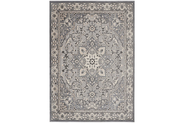 This kathy ireland® Home Grand Villa rug commands attention with a center medallion Persian floral design and stately ornamental border. Soft and sumptuous in subtle shades of gray, it creates a vintage look with modern appeal. The versatile piece is ideal for decorating the traditional, contemporary or eclectic room.Made of polypropylene and polyester | Machine made; power loomed | Backed with latex | Serged edges | Low pile | Low shedding | Vacuum regularly; no beater bar | Rug pad recommended | Imported