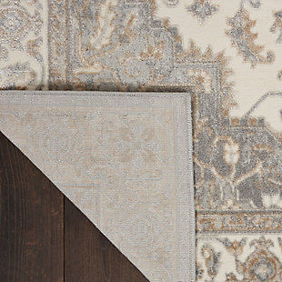 This kathy ireland® Home Grand Villa rug commands attention with a center medallion Persian floral design and stately ornamental border. Soft and sumptuous in lightly contrasting tones of gray, it creates a vintage look with modern appeal. The versatile piece is ideal for decorating the traditional, contemporary or eclectic room.Made of polypropylene and polyester | Machine made; power loomed | Backed with latex | Serged edges | Low pile | Low shedding | Vacuum regularly; no beater bar | Rug pad recommended | Imported