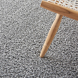 You’ll be floating on air with the cloudlike softness and misty gray tones of this Shangri-La shag area rug. Densely structured to create textured shadow and light, the rug exudes casual elegance.Made of polypropylene | Machine made; power loomed | Backed with jute | Serged edges | Shag pile | Low shedding | Rug pad recommended | Vacuum regularly; no beater bar | Imported