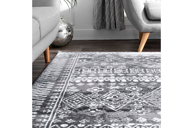 Designed for a modern lifestyle, this rug takes a classic motif and elevates it through sophisticated color palettes. Machine made of polypropylene, you can rest assured knowing you have the refined look of an heirloom piece with the easy upkeep of a synthetic fiber.100% polypropylene | Medium pile (1/3") | Resilient against everyday wear and tear, this kid- and pet-friendly rug is perfect for high traffic areas such as living room, dining room, kitchen, and hallways | Sleek and functional, ideal for entryways and underneath furniture (will not obstruct doorways) | Stylish and versatile, this moroccan patterned rug adds the right amount of chic to your space | Easy to clean and maintain (we recommend vacuuming regularly; spot treat any mild stains with carpet cleaner) | Features a distressed vintage finish | Imported