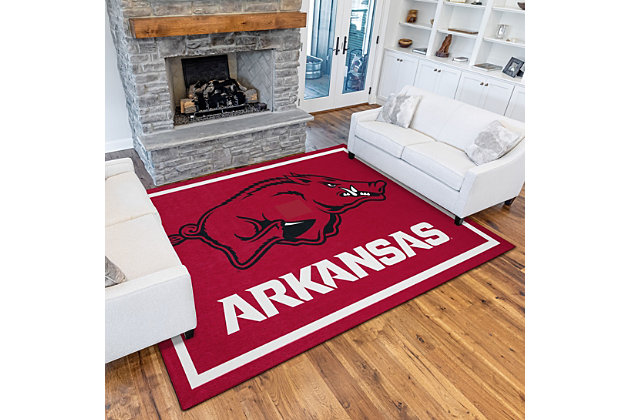Addison CAMPUS area rugs are high quality licensed collegiate team sports logo rugs. Crafted in the USA, using our state-of-the-art prismatic color processing technology. This technology allows for up to 500,000 shades of color and precision matching to your team colors. Super soft, plush low profile polyester microfiber with non-skid backing will keep your team rug secure. Easy care, vacuum regularly suction only or shake out. Family and pet friendly. Step up your team spirit with Campus Sports Rugs.Made of 100% Polyester Microfiber | Precision Collegiate Team Logo | Low 0.14-In pile height | Easy to clean, vacuum without a beater bar, recommend suction only or shake out, spot clean with mild soap and water | Prismatic color processing technology | Indoor use only | Non-skid backing, no additional pad needed | Vacuum regularly with straight suction vacuum.  Never use a beater bar vacuum on a shag rug.  Spot clean with mild soap and water.  Never pull loose rug yarns; always trim with scissors. | Imported