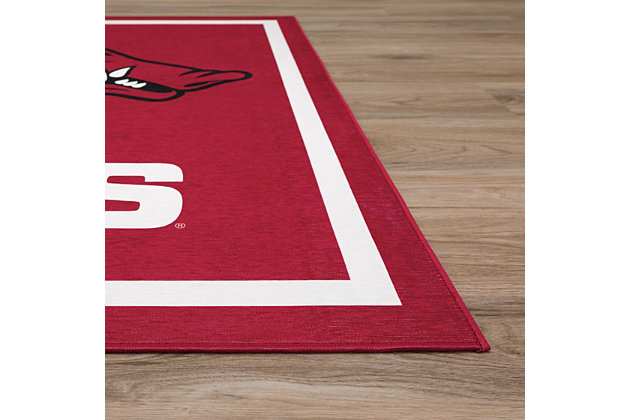 Addison CAMPUS area rugs are high quality licensed collegiate team sports logo rugs. Crafted in the USA, using our state-of-the-art prismatic color processing technology. This technology allows for up to 500,000 shades of color and precision matching to your team colors. Super soft, plush low profile polyester microfiber with non-skid backing will keep your team rug secure. Easy care, vacuum regularly suction only or shake out. Family and pet friendly. Step up your team spirit with Campus Sports Rugs.Made of 100% Polyester Microfiber | Precision Collegiate Team Logo | Low 0.14-In pile height | Easy to clean, vacuum without a beater bar, recommend suction only or shake out, spot clean with mild soap and water | Prismatic color processing technology | Indoor use only | Non-skid backing, no additional pad needed | Vacuum regularly with straight suction vacuum.  Never use a beater bar vacuum on a shag rug.  Spot clean with mild soap and water.  Never pull loose rug yarns; always trim with scissors. | Imported