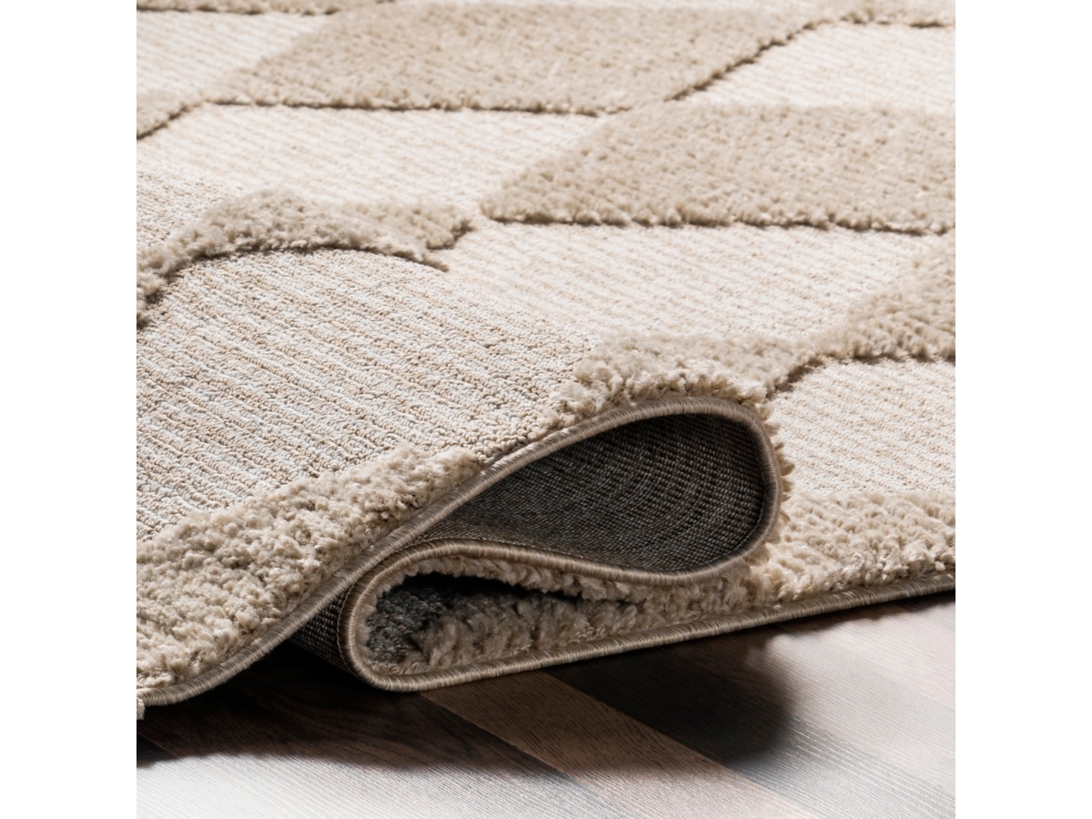 nuLOOM Marissa High/Low Diamond Tassel Area Rug | Ashley