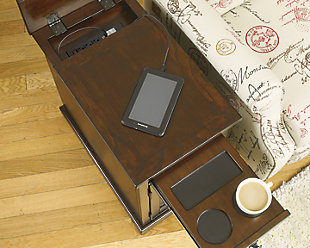 So much form and function in a beautifully compact piece of furniture. The richly styled Laflorn chairside end table puts it all within reach, including a flip-up top panel revealing a power port—perfect for keeping your phone or laptop charged. Hidden twin cup holders and interior shelved storage are also a welcome surprise.Hand-finished | Made of veneers, wood and engineered wood | Assembly required | 1 cabinet with 1 adjustable shelf | Pull-out tray with 2 recessed cup holders and remote control slot | Flip-top compartment with 3 electrical outlets, 2 USB slots | Built-in magazine rack | Power Cord, UL listed | Pewter-tone hardware | Excluded from promotional discounts and coupons
