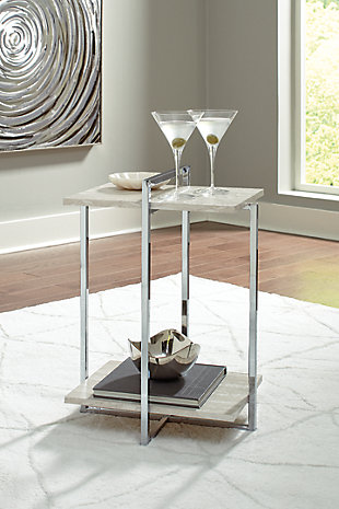 Contemporary style gets a modern attitude in the Bodalli side table. The replicated travertine stone shelf offers chic sophistication, while the box design of the metal frame creates open space to offer the illusion of more room.Made of engineered wood and decorative laminate | Chrome-tone metal frame | Faux travertine marble top and shelf | Assembly required | Estimated Assembly Time: 15 Minutes