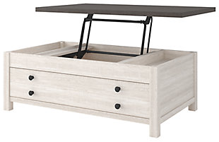 Raise the bar on modern farmhouse design with the Dorrinson lift top coffee table. Sporting a two-tone, gray and antiqued white color scheme and cross buck design, this table's handy spring-loaded mechanism brings the tabletop closer to you. This versatile table makes it easier than ever to eat, work or play from the comfort of your sofa.Made of decorative laminate over engineered wood with two-tone, gray and antiqued white color scheme | Lift top design | Assembly required | Estimated Assembly Time: 60 Minutes