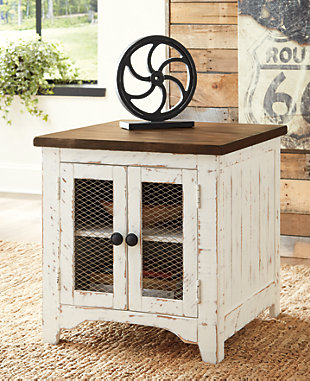 Double take. Sporting a two-tone finish that pairs a distressed vintage white with aged natural pine color, the Wystfield end table elevates the art of rustic farmhouse living. Enhancing its charm: shelved storage visible through cabinet doors with inset metal grills.Made of veneers, wood and engineered wood | Distressed finish; vintage white and aged natural pine color | Double door cabinet with metal grills and hardware | Center shelf | Assembly required | Estimated Assembly Time: 30 Minutes
