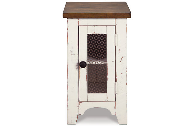 Double take. Sporting a two-tone finish that pairs a distressed vintage white with aged natural pine color, the Wystfield chairside end table elevates the art of rustic farmhouse living. Enhancing its charm: shelved storage visible through the cabinet door with inset metal grill.Made of veneers, wood and engineered wood | Distressed finish; vintage white and aged natural pine color | Single door cabinet with metal grill and hardware | Center shelf