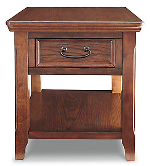 With its heirloom air and richly edited sense of style, the Woodboro rectangular end table is loaded with subtle charm. Distinctive elements including antiqued hardware and weatherworn edging add to its rustic refinement.Made of veneers, wood and engineered wood | Hand-finished | Dark bronze-tone hardware | 1 drawer | 1 fixed shelf | Assembly required