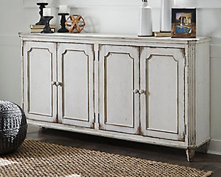 With its distressed vintage paint finish, fluted details and French provincial mouldings, the exquisite Mirimyn cabinet is sure to grace your space in such a très chic way. Adjustable shelved storage is abundantly practical, be it in a dining room, living room or entryway.Made of veneers, wood and engineered wood | 4 cabinet doors revealing 2 adjustable shelves | Assembly required | Excluded from promotional discounts and coupons | Estimated Assembly Time: 30 Minutes