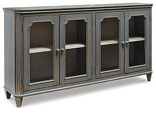 With its distressed vintage paint finish, fluted details and graceful styling inspired by French provincial furniture, the exquisite Mirimyn cabinet puts the accent on très chic living. Adjustable shelved storage is abundantly practical, be it in a dining room, living room or entryway.Made of veneers, wood and engineered wood | 4 cabinet doors with glass inlays revealing 2 adjustable shelves | Assembly required | Excluded from promotional discounts and coupons | Estimated Assembly Time: 30 Minutes