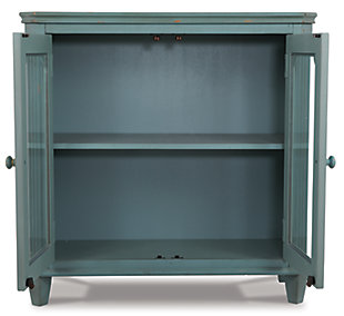 With its distressed vintage paint finish, fluted details and French provincial mouldings, the exquisite Mirimyn glass-front cabinet is sure to grace your space in such a très chic way. Adjustable shelved storage makes this versatile cabinet that much more practical.Made of veneers, wood and engineered wood | 2 cabinet doors with glass inlays revealing an adjustable shelf | Assembly required | Excluded from promotional discounts and coupons | Estimated Assembly Time: 30 Minutes