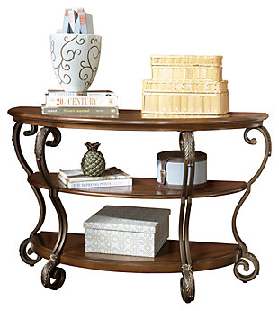 If there’s an accent piece with a flair for making traditional elements look so fit for modern-classic settings—the Nestor sofa table is it. It’s hard to not fall for the elegance and intricacy of acanthus leaf carvings and shapely serpentine legs. Tiered shelving design has such lovely symmetry.Hand-finished | 2 fixed shelves | Assembly required | Made of engineered wood with metal accents | Oil-rubbed-bronze-tone legs | Estimated Assembly Time: 30 Minutes