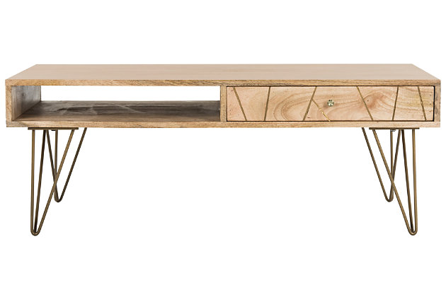 Striking and stylish, the mid-century influence of this rectangular coffee table is evident in the hairpin design legs. Crafted of mango wood with an asymmetric drawer design, its minimalist lines are highlighted with a natural finish that allows the beauty of the wood grain to steal the show.Made of mango wood | Natural finish | Brass-tone powdercoat metal legs | Clean with a soft, dry cloth | Assembly required