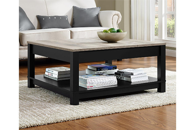 Merging modern and minimalist design, this two-tone coffee table turns display space into an art form. Dual finish of wood tones and black is right on trend. Streamlined design proves that less is more.Made of laminated engineered wood | Matte black finish with a distressed woodgrain top | 2 levels of display space | Assembly required