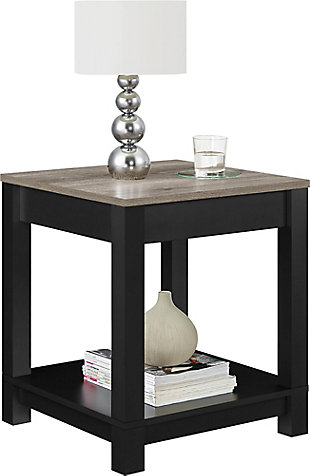 Merging modern and minimalist design, this two-tone end table turns display space into an art form. Dual finish of wood tones and black is right on trend. Streamlined design proves that less is more.Made of laminated engineered wood | Matte black finish with a distressed woodgrain top | 2 levels of display space | Assembly required