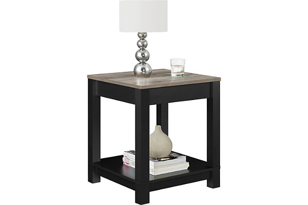 Merging modern and minimalist design, this two-tone end table turns display space into an art form. Dual finish of wood tones and black is right on trend. Streamlined design proves that less is more.Made of laminated engineered wood | Matte black finish with a distressed woodgrain top | 2 levels of display space | Assembly required