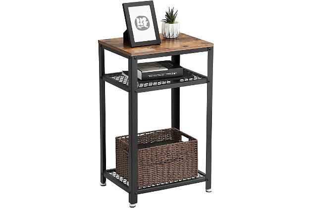 Serve up a simply sensational aesthetic with this industrial chic side table. Crafted with a sturdy, matte black iron frame and topped with engineered wood beautified with a rustic finish, this cool, clean-lined side table is sure to look right at home—everywhere from modern farmhouses to city lofts. Wire grill shelves add to its allure.Matte black metal frame with 2 wire grill shelves | Engineered wood tabletop in rustic finish | Assembly required