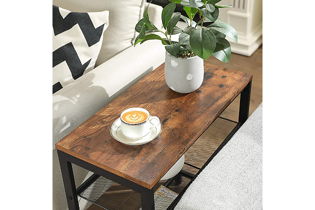 Industrial vibes make the mojo in this end table. The rustic surface, linear legs, and mesh shelves form the table’s sleek profile and contribute to its industrial charm. Not under- or overdressed, industrial style is just rightDense mesh shelves | Narrow, slim profile | Rustic brown board and black metal frame | Assembly required