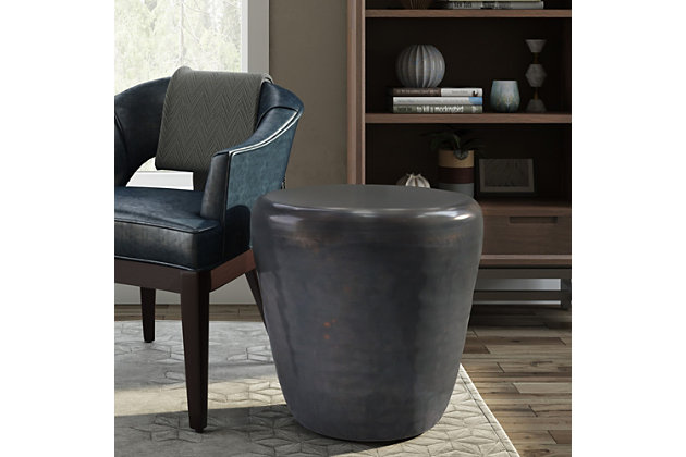 Add a distinctive finishing touch to your favorite seating space with the Garvy side table, handcrafted from metal. Showcasing a drum silhouette, this table's clean lines add visual appeal to your decor. Play up its versatility by placing it in your living room, den or bedroom.Dimensions: 20" W x 20" D x 22" H | Handcrafted with care using premium solid metal | Hand finished in an antique copper | Multipurpose table can be used as an end table or side table. Looks great in your living room, great room, condo, bedroom or office | Industrial design features popular drum shape | Fully assembled | We believe in creating excellent, high quality products made from the finest materials at an affordable price. Every one of our products come with a 1-year warranty and easy returns if you are not satisfied.