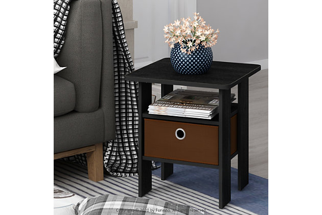 Create the prefect living room space with this Furinno End Table with Bin. This end table will sit perfectly next to your chair or sofa and both beautiful and functional. Featuring one fabric drawer is perfect for keeping DVDs and remotes corralled, while an open shelf makes a marvelous spot to put a lush potted succulent on display. Rounded edge design prevents potential injuries. This storage end table is easy assembly with step by step instruction. Care instructions: wipe clean with clean damped cloth. Avoid using harsh chemicals. Pictures are for illustration purpose. All decor items are not included in this offer.Compact stylish design: petite size end table with storage bin and shelf, suitable for spaces. | Quality material: high quality density composite wood and non-woven fabric. | Added safety feature: rounded corner reduces the risk of injury. | Furinno fits: fits in your space, fits on your budget. | Product dimension: 15.75(w)x15.75(w)x17.5(h) inches. Tabletop holds up to 15 lbs.