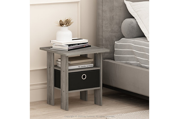 Create the prefect living room space with this Furinno End Table with Bin. This end table will sit perfectly next to your chair or sofa and both beautiful and functional. Featuring one fabric drawer is perfect for keeping DVDs and remotes corralled, while an open shelf makes a marvelous spot to put a lush potted succulent on display. Rounded edge design prevents potential injuries. This storage end table is easy assembly with step by step instruction. Care instructions: wipe clean with clean damped cloth. Avoid using harsh chemicals. Pictures are for illustration purpose. All decor items are not included in this offer.Compact stylish design: petite size end table with storage bin and shelf, suitable for small spaces. | Quality material: high quality medium density composite wood and non-woven fabric. | Added safety feature: rounded corner reduces the risk of injury. | Furinno fits: fits in your space, fits on your budget. | Product dimension: 15.75(w)x15.75(w)x17.5(h) inches. Tabletop holds up to 15 lbs. | Rounded edge design prevents potential injuries.