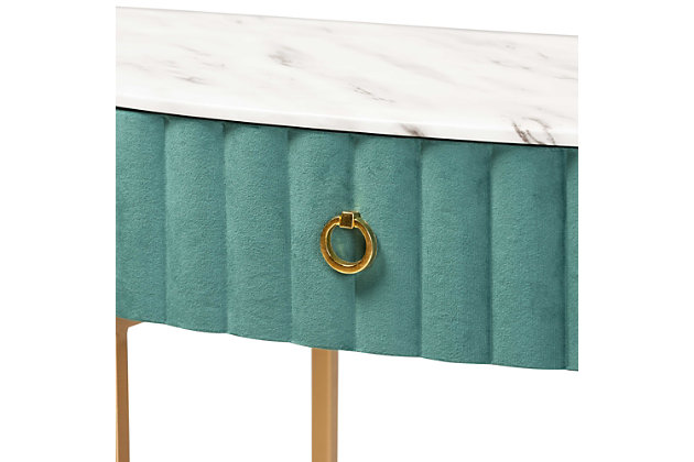 Add unique, glamorous charm to your space with the Beale console table. Made in China, the Beale is comprised of a metal frame finished in a stunning gold tone. The spacious tabletop is upholstered in a sleek marble effect PU leather for a luxurious aesthetic that also serves to declutter busy areas. One drawer provides storage space and is upholstered in green velvet fabric enhanced with alluring channel tufting. A gold-tone ring pull adds an extra touch of glamour. Requiring assembly, its slim frame makes it well suited for tighter spaces. Instantly upgrade your entryway or hallway with the dazzling Beale console table.Constructed from MDF wood and metal | Marble effect PU leather upholstered tabletop | Velvet polyester fabric upholstered drawer | Channel tufted