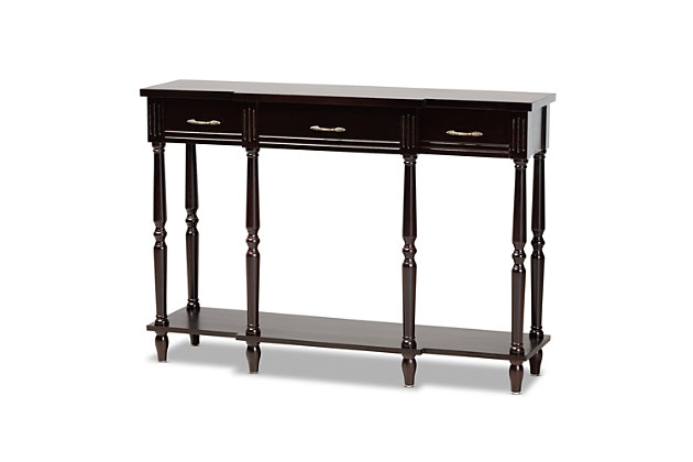 Revitalize your entryway with the elegant and efficient Hallan console table. Made in China, this wood console is equipped with three drawers along with a lower shelf to store mail and display decor. Crisp lines lend a contemporary look, while a dark brown wood finish and ring turned legs add traditional appeal. The Hallan requires assembly and is accented with antique gold tone metal drawer pulls for a touch of vintage charm. With plenty of surface area for storage and decorations, the Hallan console table is a fantastic addition to any entryway.Constructed from firwood and engineered wood | Dark brown finish | Three (3) drawers | Lower shelf