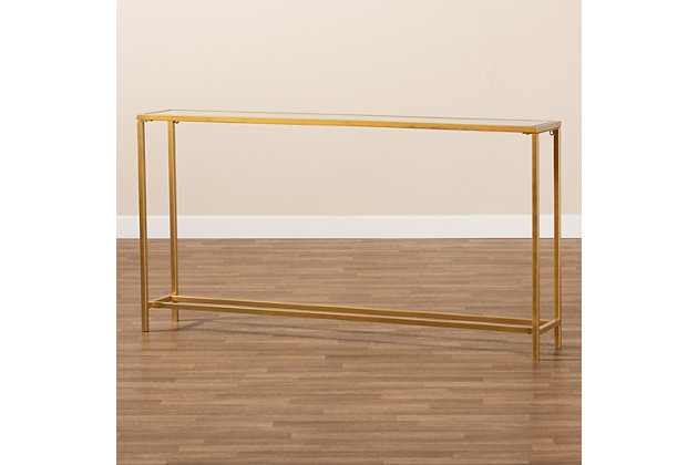 Add sleek, contemporary charm to your home with the stunning Alessa console table. Made in China, the Alessa is comprised of a minimalist brushed gold finished metal frame fitted with a mirrored glass tabletop. Its slim silhouette, coupled with its large surface area, make the Alessa an ideal accent piece for entryways or hallways. Requiring assembly, the table is equipped with black non marking feet to protect floors. A beautiful pedestal for decorations or everyday items, the Alessa console table is a luxurious addition to the modern home.Modern and contemporary console table | Constructed from metal and mirrored glass | Brushed gold finish | Rectangular tabletop 