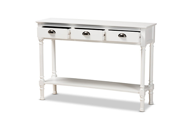 Reinvent your entryway with the elegant and handy Garvey console table. Made in China, the Garvey is constructed from sturdy wood showcasing a striking white finish. Three large drawers provide ample space for concealed storage, while the rectangular tabletop and lower shelf provide space to display decorations. Requiring assembly, the console features ring-turned legs that lend a classic look, while silver metal drawer handles add a modern touch. Astonishing design equipped with practical storage capability, the Garvey console table upgrades any entryway or living room.Constructed from firwood and engineered wood | White finish | Three (3) drawers and one (1) shelf | Black metal drawer handles