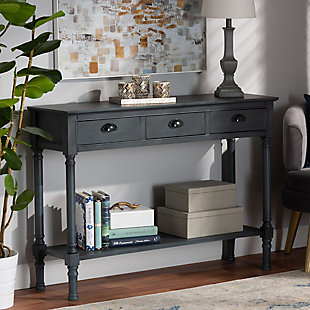 Reinvent your entryway with the elegant and handy Garvey console table. Made in China, the Garvey is constructed from sturdy wood showcasing a striking grey finish. Three large drawers provide ample space for concealed storage, while the rectangular tabletop and lower shelf provide space to display decorations. Requiring assembly, the console features ring-turned legs that lend a classic look, while black metal drawer handles add a modern touch. Astonishing design equipped with practical storage capability, the Garvey console table upgrades any entryway or living room.Constructed from firwood and engineered wood | Grey finish | Three (3) drawers and one (1) shelf | Black metal drawer handles