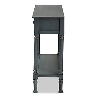 Reinvent your entryway with the elegant and handy Garvey console table. Made in China, the Garvey is constructed from sturdy wood showcasing a striking grey finish. Three large drawers provide ample space for concealed storage, while the rectangular tabletop and lower shelf provide space to display decorations. Requiring assembly, the console features ring-turned legs that lend a classic look, while black metal drawer handles add a modern touch. Astonishing design equipped with practical storage capability, the Garvey console table upgrades any entryway or living room.Constructed from firwood and engineered wood | Grey finish | Three (3) drawers and one (1) shelf | Black metal drawer handles