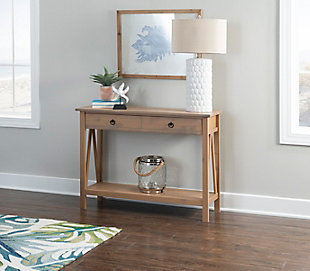 Put your effortlessly chic sense of style on display with the Titian console table. Perfect in an entry or at the end of a hallway, it also doubles beautifully as a sofa table. The rustic pine wood has a finish with driftwood tones, making it a natural fit in shabby chic, coastal cool and eclectic spaces.Made of pine wood | 2 smooth-gliding drawers | Ring pull hardware | Assembly required