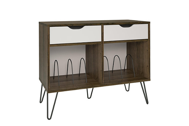 Add a blast from the past with the Novogratz Concord Turntable Stand with Drawers. Inspired from mid-century design, the laminated particleboard and MDF complement the black metal hairpin legs for a fun retro look. The dark brown woodgrain chassis and contrasting gray drawer fronts with light brown undertones pair well with any décor from modern to classic. The double wide stand offers plenty of space to place a record player, speakers, and stereo or even decorations. Keep your remotes, cassette tapes, and record mats or weights for your singles stored away and organized in the 2 drawers. The drawer cutout gives the stand a clean, no-handle look that is easy to open. Keep all of your albums organized in the large open cubbies that feature metal record dividers to keep all of your albums upright. The Novogratz Concord Turntable Stand with Drawers ships flat to your door and 2 adults are recommended for assembly upon opening. The Stand can hold up to 60 lbs. while the cubbies will hold 20 lbs. each. Each drawer can hold up to 15 lbs. Upon assembly, the Stand measures to be 31.8"H x 39.7"W x 18"D.Take it back in time with the novogratz concord turntable stand with drawers | The dark brown woodgrain chassis and contrasting gray drawer fronts with light brown undertones on the laminated particleboard and mdf offer a strong build that complements the mid-century inspired black metal hairpin legs | The double wide stand offers plenty of space for a record player, speakers and stereo and features 2 large open cubbies with metal dividers to keep your albums upright and organized. Keep your remotes, cassette tapes, and record mats or weights stored away in the 2 spacious drawers | Complete your collection with other novogratz items (sold separately) | The novogratz concord turntable stand with drawers ships flat to your door and 2 adults are recommended for assembly. The stand can hold up to 60 lbs. While the cubbies will hold 20 lbs. Each. Each drawer can hold up to 15 lbs. Assembled dimensions: 31.8"h x 39.7"w x 18"d | 1 year limited warranty included