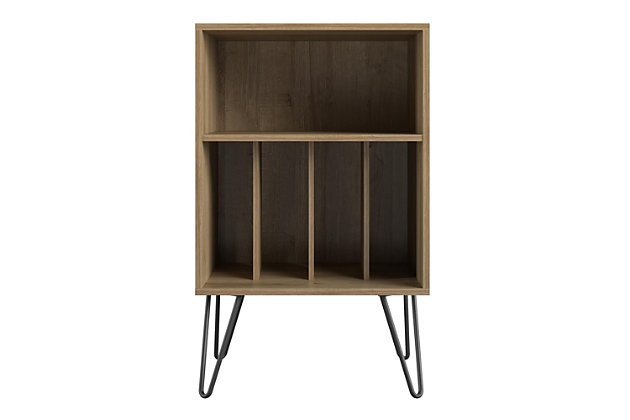 Give your living room or entertainment space a retro look with the Novogratz Concord Turntable Stand. Inspired by mid-century design, the two-tone light brown woodgrain and matte black finish on the laminated particleboard and MDF pairs with the black metal hairpin legs for a retro twist. The Stand is the perfect size to place your record player and the open cubbies offer plenty of options to keep your albums organized. You can store them upright in the 4 lower cubbies or keep your favorites at the top in the large upper cubby. The Novogratz Concord Turntable Stand ships flat to your door and requires assembly upon opening. Two adults are recommended to assemble. The Stand can hold up to 30 lbs. and the large cubby will hold 25 lbs. Each smaller cubby will hold up to 5 lbs. Once assembled, the Stand measures to be 34.13"H x 20.7"W x 18"D.Take it back in time with the novogratz concord turntable stand | Made of laminated mdf and particleboard, the light brown woodgrain chassis and matte black with brown undertones record dividers pairs with the mid-century inspired black metal hairpin legs for a fun, retro look | The stand is the perfect size to place your record player and keep your albums organized in the 4 lower cubbies or keep your favorites at the top in the large upper cubby | Complete your collection with other novogratz concord items (sold separately) | The novogratz concord turntable stand ships flat to your door and 2 adults are recommended to assemble. The stand can hold up to 30 lbs. And the large cubby will hold 25 lbs. Each smaller cubby will hold up to 5 lbs. Assembled dimensions: 34.13"h x 20.7"w x 18"d | 1 year limited warranty included
