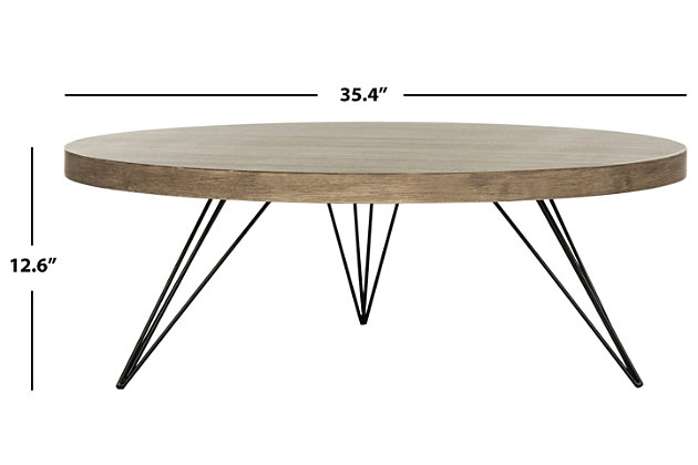 A top ski resort in the Italian alps inspired the modern rustic style of the contemporary Mansel coffee table. Designed for the cosmopolitan interior, its metallic angular base is expertly paired with a warm circular light gray top for timeless sophistication.Made with wood and iron | Top with light gray finish | Imported | Assembly required