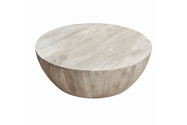 Showcasing a great piece of artistry, this round coffee table features a smooth, wide top that can be used for serving snacks or displaying decor. This piece has a narrow, flat base that provides stability, while the washed light brown finish adds depth to its distressed plank wood texture.Made of mango wood | Light brown finish | Distressed details