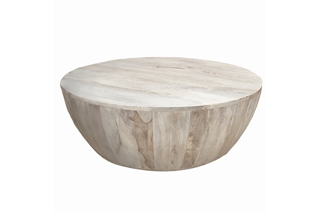 Showcasing a great piece of artistry, this round coffee table features a smooth, wide top that can be used for serving snacks or displaying decor. This piece has a narrow, flat base that provides stability, while the washed light brown finish adds depth to its distressed plank wood texture.Made of mango wood | Light brown finish | Distressed details