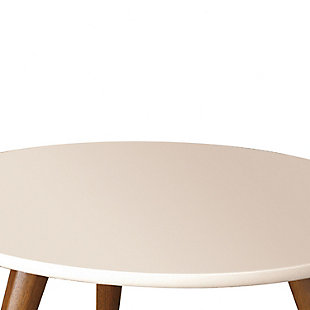 Transform your living space with this mid-century inspired round coffee table. Showcasing a minimalistic design, this table incorporates a tabletop in a white finish, supported on a walnut finished tapered splay legs. It will surely be a focal point in your living room, exuding sophistication and elegance.Made of wood and engineered wood | Top in white finish | Legs in walnut finish | Tapered splay legs | Assembly required