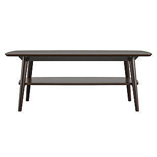 Complete your living room with the Novogratz Brittany Coffee Table. The beautiful walnut finish on wood veneer gives the look and feel of real wood and pairs with the angled real wood legs for a trendy mid-century modern look. The spacious table top can hold your books and magazines, coasters, snacks and electronics and features a rounded edge to add to the mid-century modern charm. The lower shelf can organize books and magazines to keep your table top clutter free. The Coffee Table ships flat to your door and requires assembly upon opening. Two adults are recommended to assemble. Once assembled, the Coffee Table measures to be 18"H x 47.375"W x 25.7"D.Give your living room a mid-century modern feel with the novogratz brittany coffee table | Made with wood veneer with real wood legs, the beautiful walnut finish pairs with the angled legs for a trendy look | Organize books, magazines, remotes and electronics on the table top and lower shelf. The lower shelf keeps your table top clutter free and keeps essentials within reach | The coffee table ships flat to your door and 2 adults are recommended to assemble. The table top can hold up to 65 lbs. While the lower shelf holds up to 25 lbs. Assembled dimensions: 18"h x 47.375"w x 25.7"d